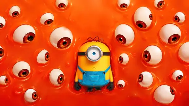 Egy szemű Minion narancssárga háttérben lebegő szemekkel